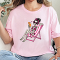 Skeleton in Lawn Chair Graphic Tee - Soft Pink